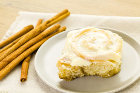 Freshly baked sourdough cinnamon rolls on the table.の写真素材