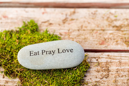 Small garden stones engraved with signs.