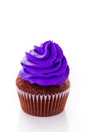 Cupcakes decorated with bright color icing for Mardi Gras party.の写真素材