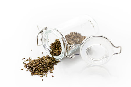Dry seeds for baking bread in small glass jars.