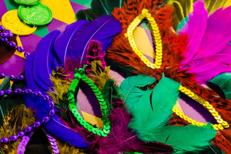 Multicolored decorations for Mardi Gras party on the table.の写真素材
