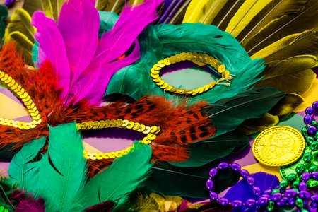 Multicolored decorations for Mardi Gras party on the table.の写真素材