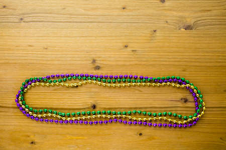 Multicolored decorations for Mardi Gras party on the table.の写真素材