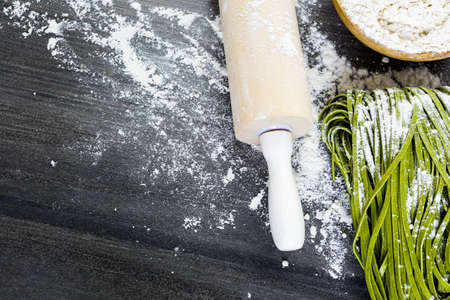 Making homemade linguine pasta with farm fresh produce.の写真素材