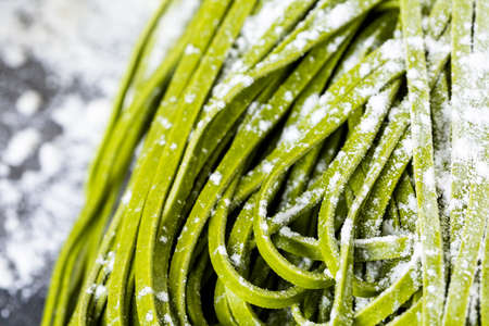 Making homemade linguine pasta with farm fresh produce.の写真素材