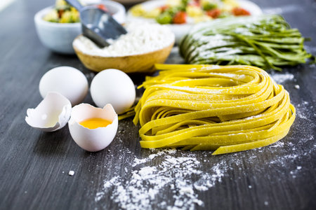 Making homemade linguine pasta with farm fresh produce.の写真素材