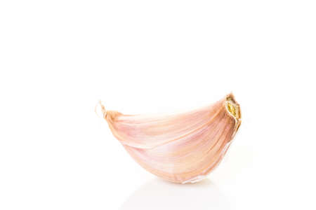 Organic garlic on a white background.の写真素材