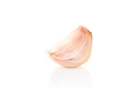 Organic garlic on a white background.の写真素材