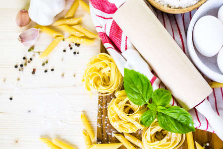 Ingredients for making fettuccine pasta recipe.の写真素材