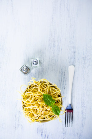 Simply coocked spaghetty in a white bowl.の写真素材