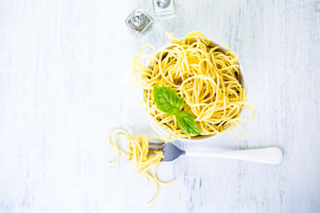 Simply coocked spaghetty in a white bowl.の写真素材