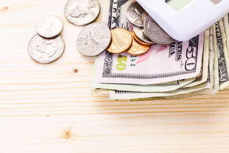 American bills and coins on the table.の写真素材