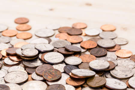 American coins on wood table.の写真素材