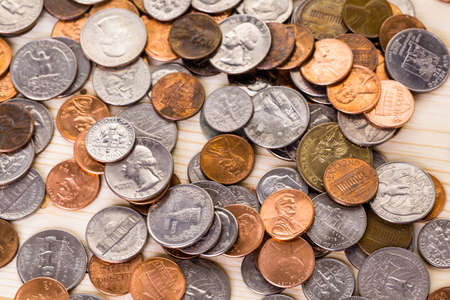 American coins on wood table.の写真素材