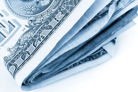American bills on a white backgreound.の写真素材