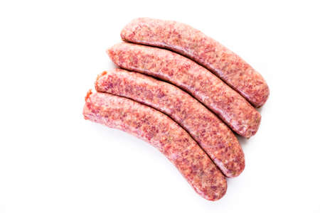 Raw Italian sausage on a white .の写真素材