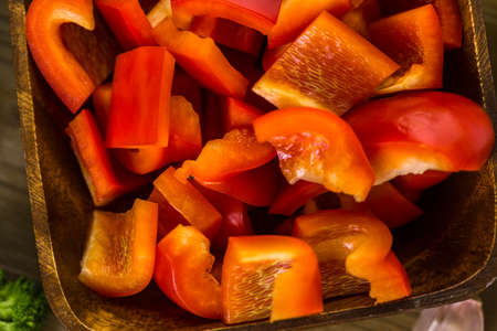Fresh ingredients for preparing roasted mixed vegetables on the table.の写真素材