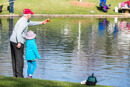 Annual Fishing Derby at Tommy Davis Park, Greenwood Village, Colorado.のeditorial素材