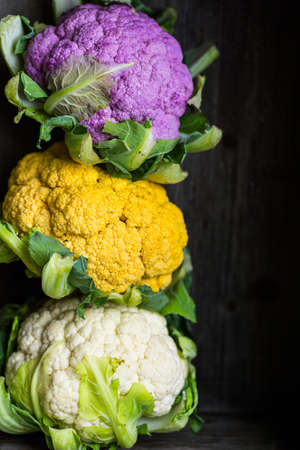 Rainbow of organic cauliflower from the local market.の写真素材