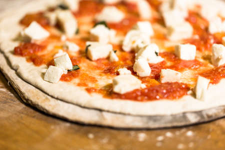 Making Napolitana Style Pizza in Italian restaurant.の写真素材