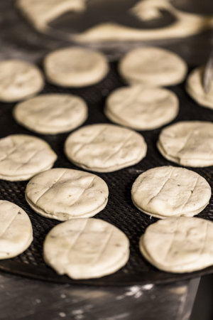 Baking bread for Italian meatball sliders in Italian restaurant.の写真素材