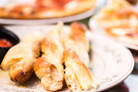 Fresh Italian garlic bread baked in restaurant.の写真素材