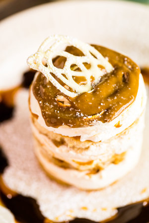 Fresh Italian Dulce de Leche with coffee on the table.