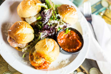 Fresh Italian meatball sliders on the table in Italian restaurant.の写真素材