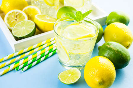 Infused water with fresh citrus fruits and ice.の写真素材