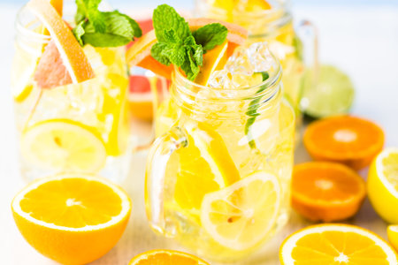 Infused water with fresh citrus fruits and ice.