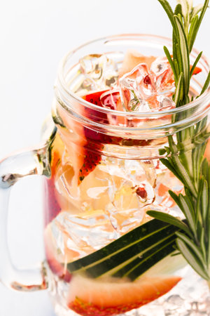 Fresh infused water made with organic ccitruses and berries.の写真素材