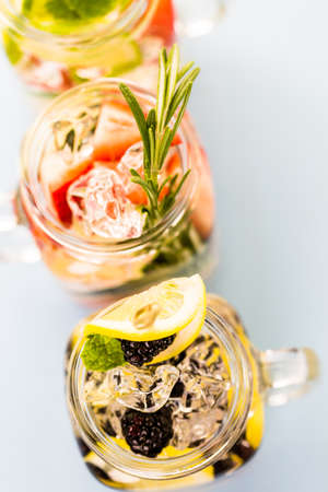Fresh infused water made with organic ccitruses and berries.の写真素材