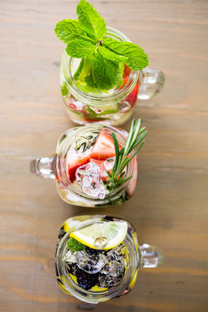 Fresh infused water made with organic ccitruses and berries.の写真素材