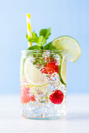 Fresh infused water made with organic ccitruses and berries.の写真素材