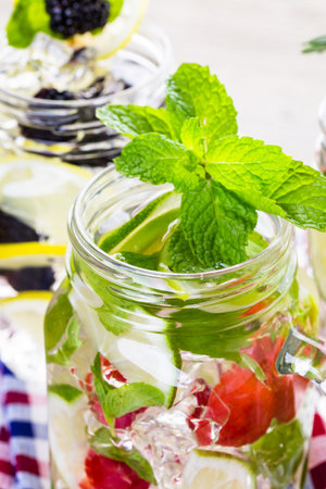 Fresh infused water made with organic ccitruses and berries.の写真素材