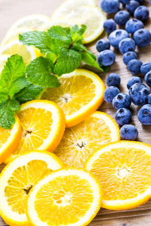Sliced fresh organic fruits prepared to make infused water.の写真素材