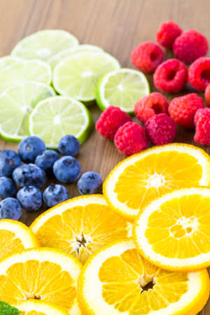 Sliced fresh organic fruits prepared to make infused water.の写真素材