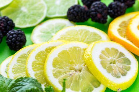 Sliced fresh organic fruits prepared to make infused water.の写真素材