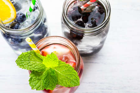 Infused water with fresh organic berries.の写真素材