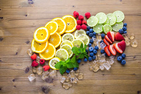 Sliced fresh organic fruits prepared to make infused water.の写真素材