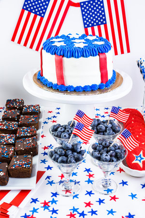 Variety of desserts on the table for July 4th party.の写真素材