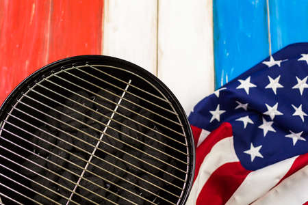 Table set with white, blue and red decorations for July 4th barbecue.の写真素材