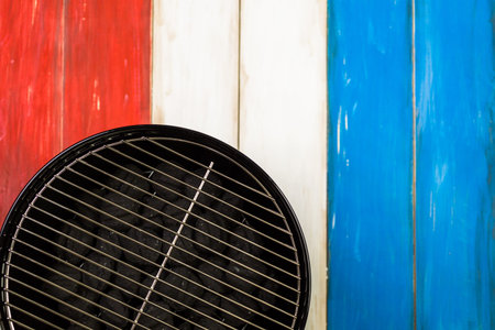 Table set with white, blue and red decorations for July 4th barbecue.の写真素材