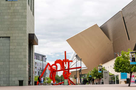 Denver, Colorado, USA-June 11, 2015. Plaza with red sculpture near Denver Art Museum.のeditorial素材