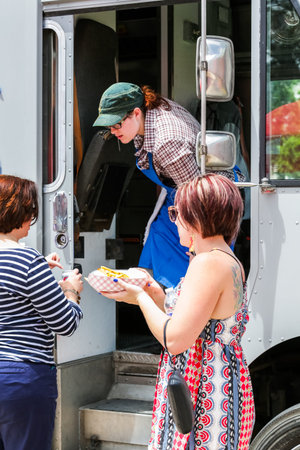 Denver, Colorado, USA-June 11, 2015.  Gathering of gourmet food trucks and carts in Downtown Denver Civic Center Park.のeditorial素材