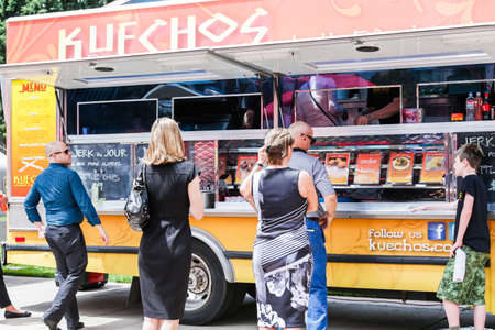 Denver, Colorado, USA-June 11, 2015.  Gathering of gourmet food trucks and carts in Downtown Denver Civic Center Park.のeditorial素材