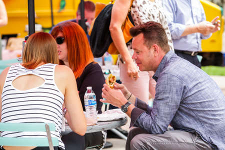 Denver, Colorado, USA-June 11, 2015.  Gathering of gourmet food trucks and carts in Downtown Denver Civic Center Park.のeditorial素材