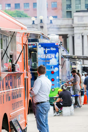 Denver, Colorado, USA-June 11, 2015.  Gathering of gourmet food trucks and carts in Downtown Denver Civic Center Park.のeditorial素材