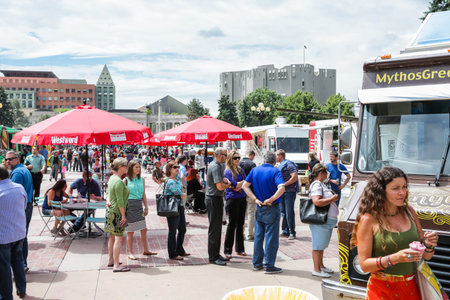 Denver, Colorado, USA-June 11, 2015.  Gathering of gourmet food trucks and carts in Downtown Denver Civic Center Park.のeditorial素材