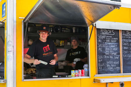 Denver, Colorado, USA-June 11, 2015.  Gathering of gourmet food trucks and carts in Downtown Denver Civic Center Park.のeditorial素材
